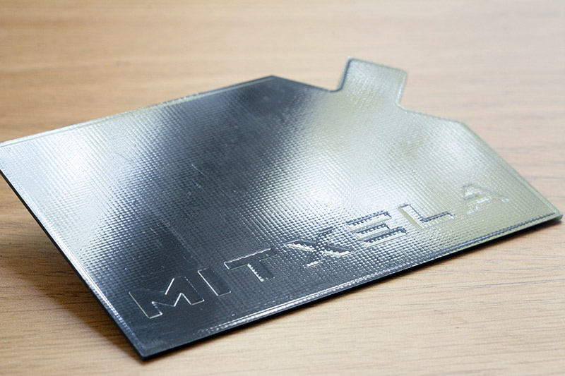 Reverse of the stylocard, with embossed mitxela logo