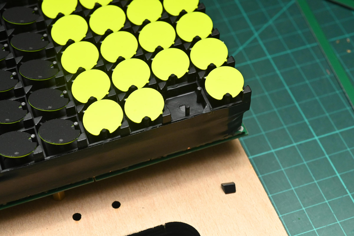 A dot missing one of the pivot points, with the broken plastic next to it