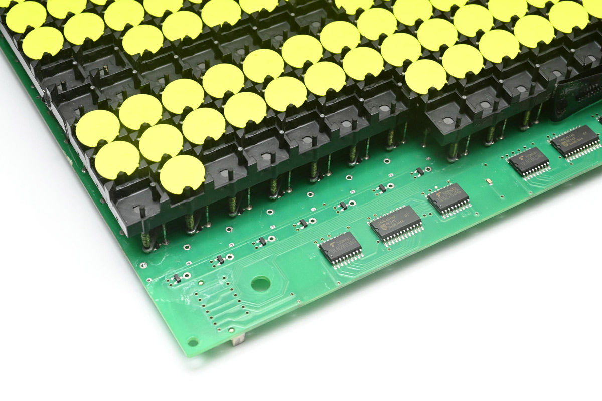Closeup of the desoldered group of flipdots, with diodes on the row connections visible