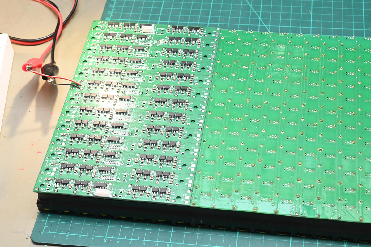 First PCB soldered onto the back of a flipdot panel