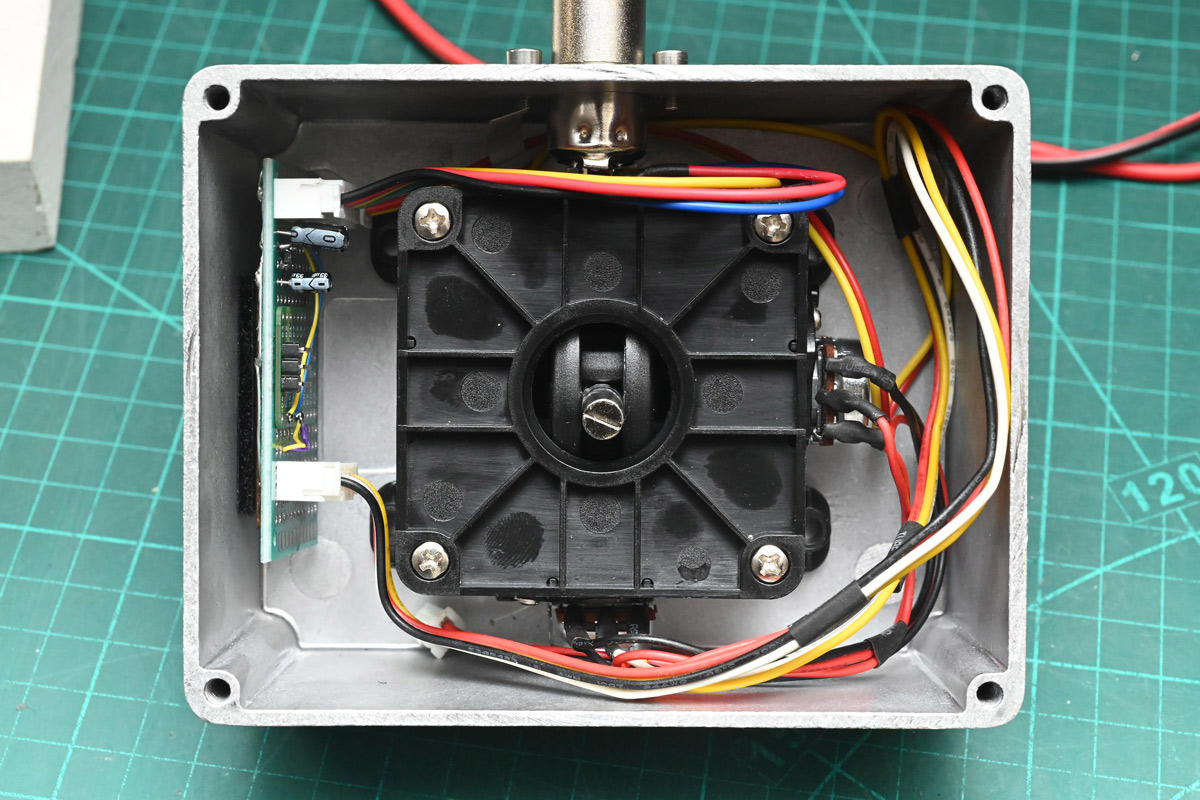 Parts connected inside of joystick enclosure