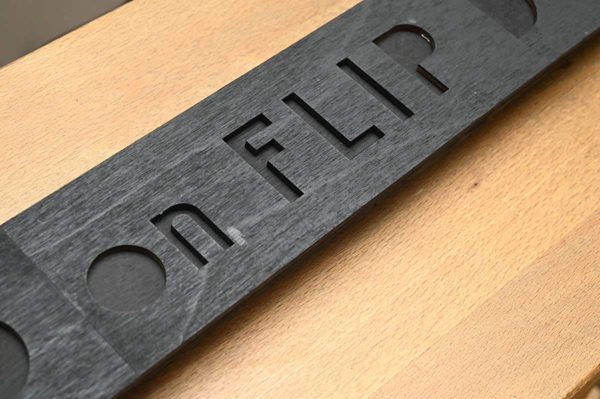 Laser cut backing of logo