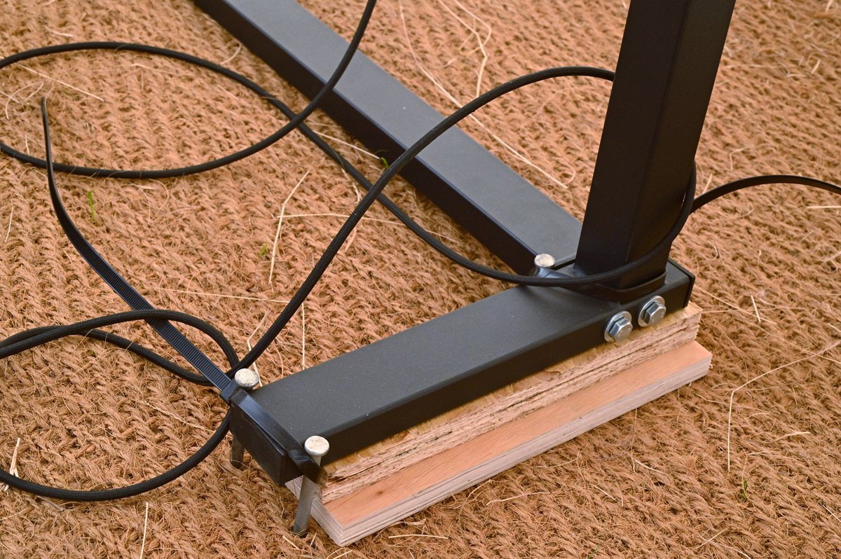 Feet levelled with wood and pegged down