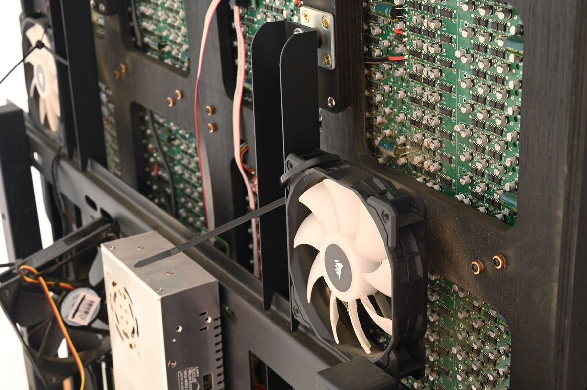 Fans fitted to back of installation, dusty