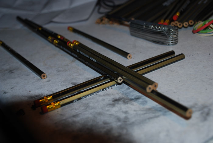 Pencils arranged to form the shaft of the ballista