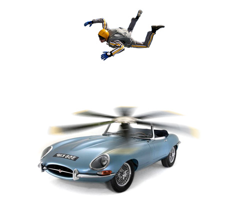 Illustration of the flying car, a skydiver floats above a Jaguar E-type with a large propeller on it