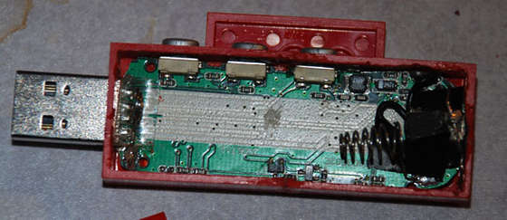 The circuit board fully within the Lego case