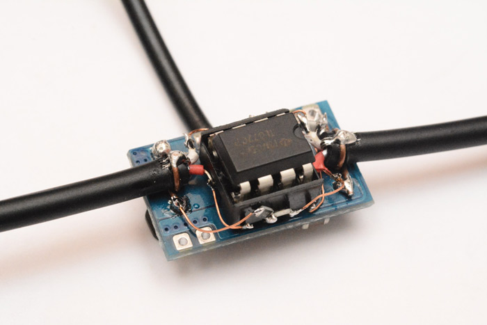 Closeup of the socketed opamp and the strain relief for the cables