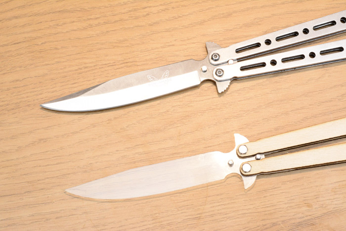 Comparison of real butterfly knife and laser-cut creation