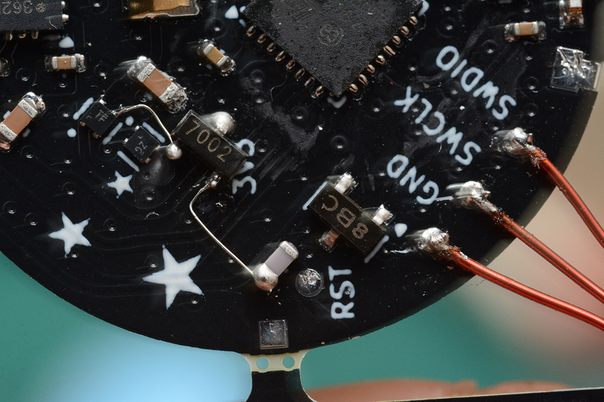 Mosfet soldered with bodge wire to the pins of the X2SON chip