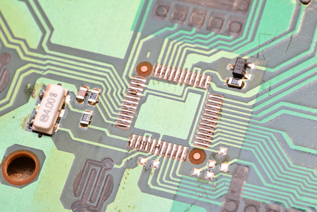PCB after hot air removal of the main chip