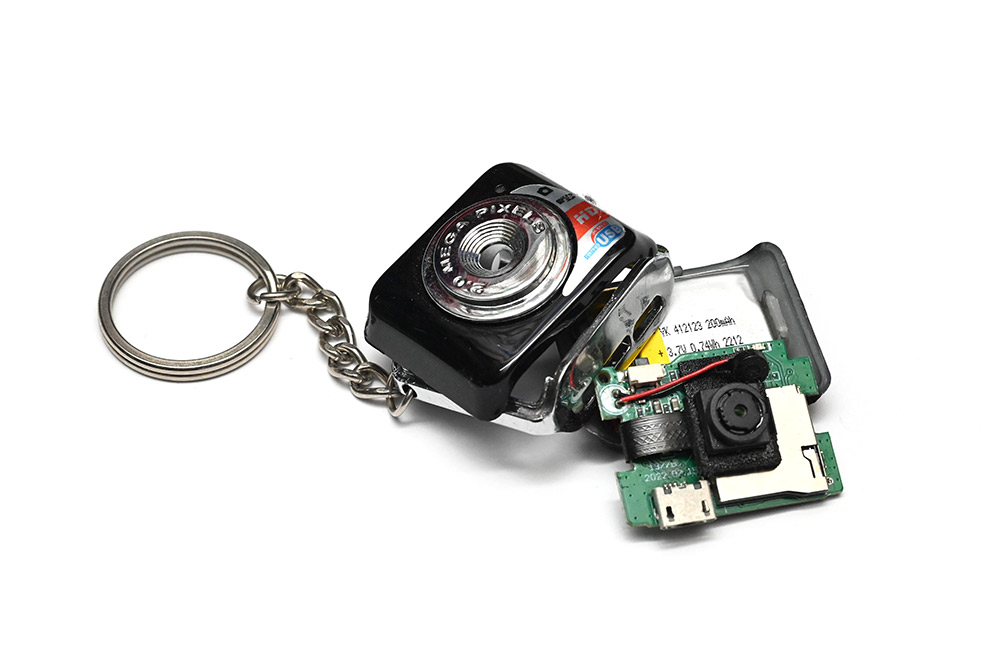 Partially disassembled keychain camera