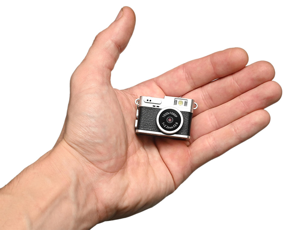 Tiny rangefinder-style digital camera in the palm of my hand
