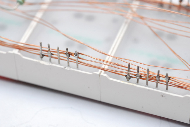 Wiring up the 7-segment displays using enamel wire