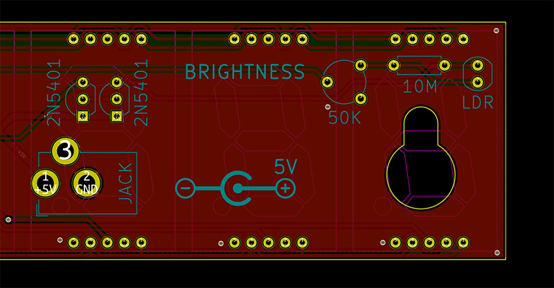Screenshot of PCB with screw keyholes and vector drawing of barrel jack
