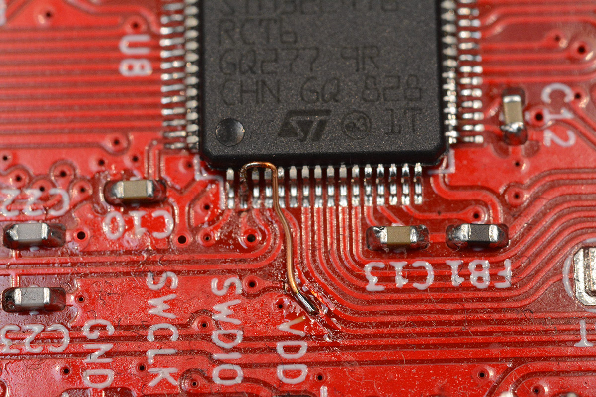Magnet wire used to re-route a signal around the extended crystal tracks