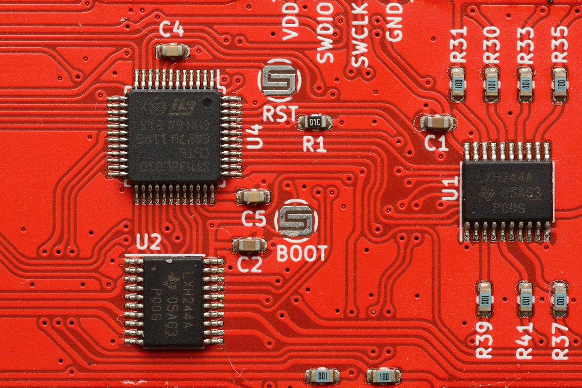 Boot and reset PCB switches on date side