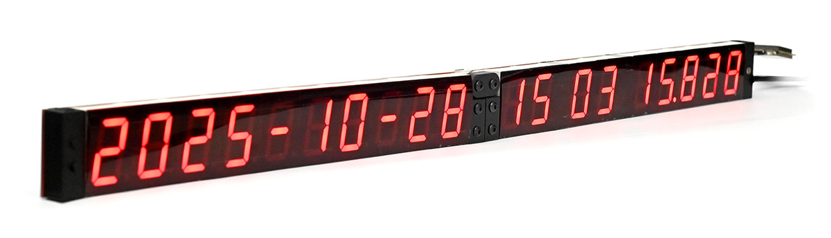 Precision clock with lighting gel carefully taped over the displays, unfolded