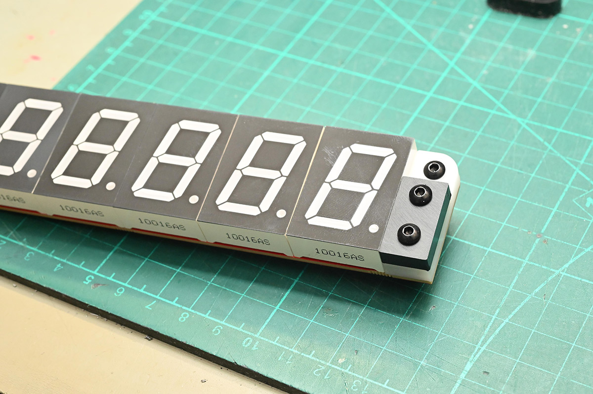 Starting to assemble the clock with the sanded hinge piece