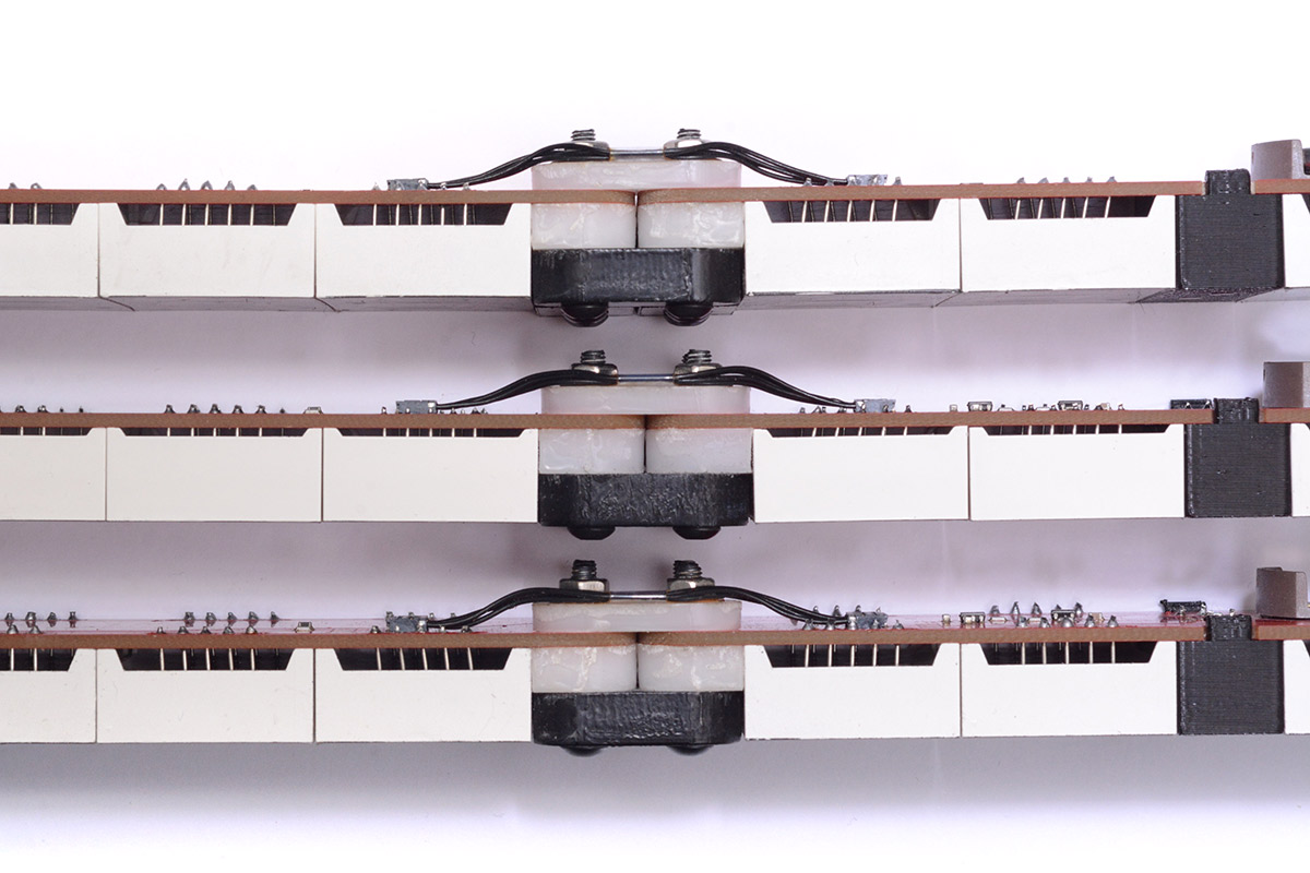 Comparison of three clocks with nominally the same, but slightly different 7-segment displays