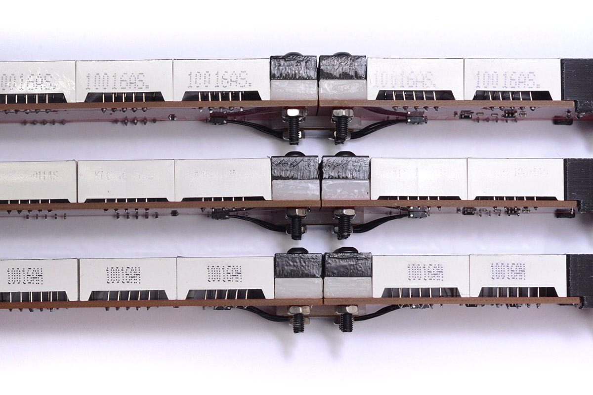 Another comparison of three clocks with slightly different 7-segment displays