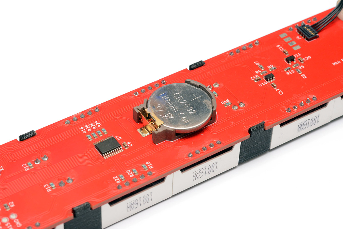Closeup of coin cell fitted