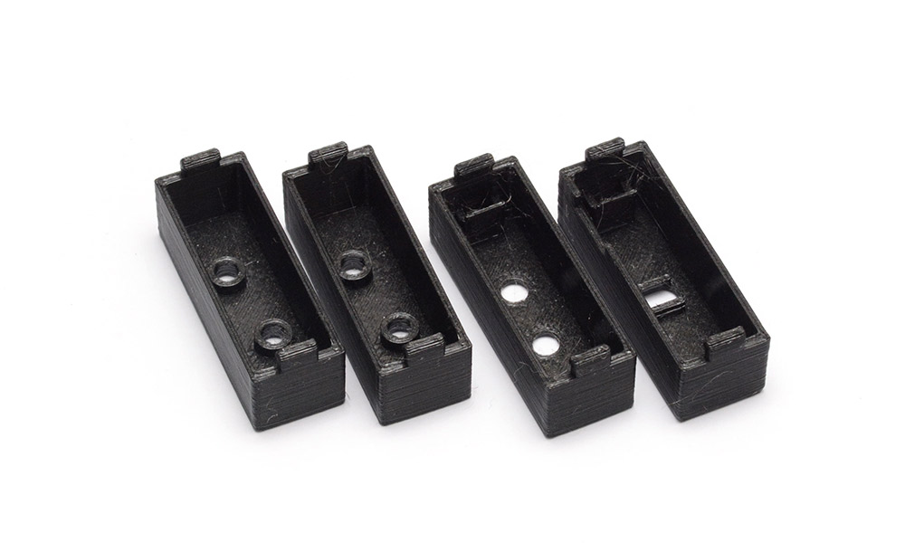 Four 3D-printed parts