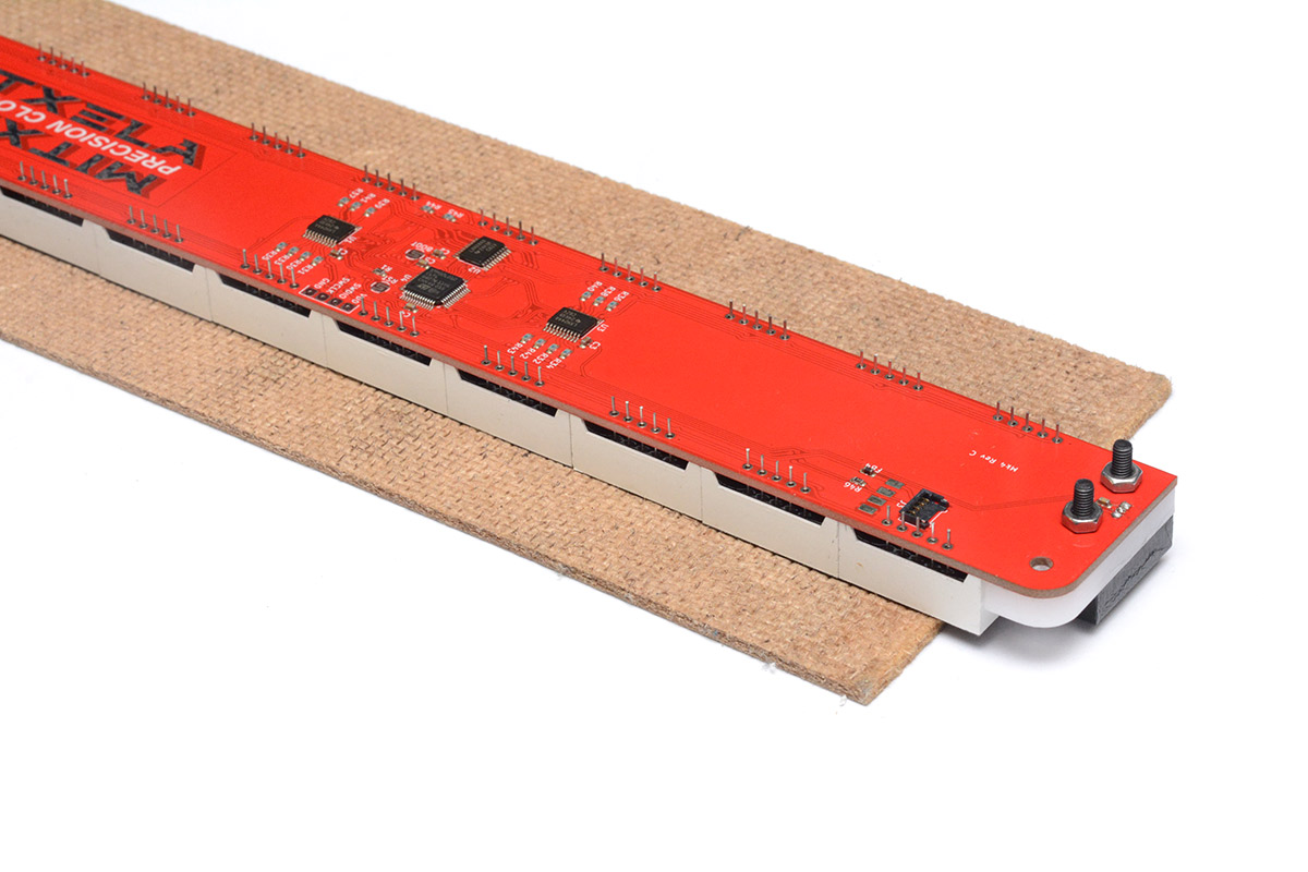 Using some scrap board to support the digits