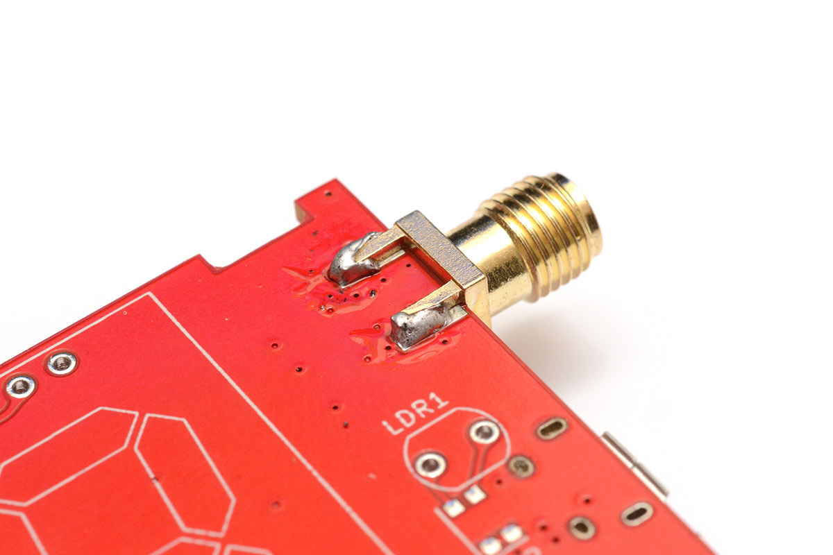 Underside of SMA connector soldered