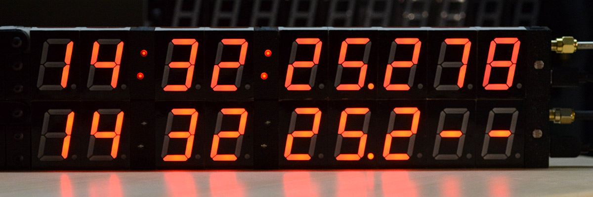 Two clocks, with one displaying time to the millisecond, and another to the decisecond