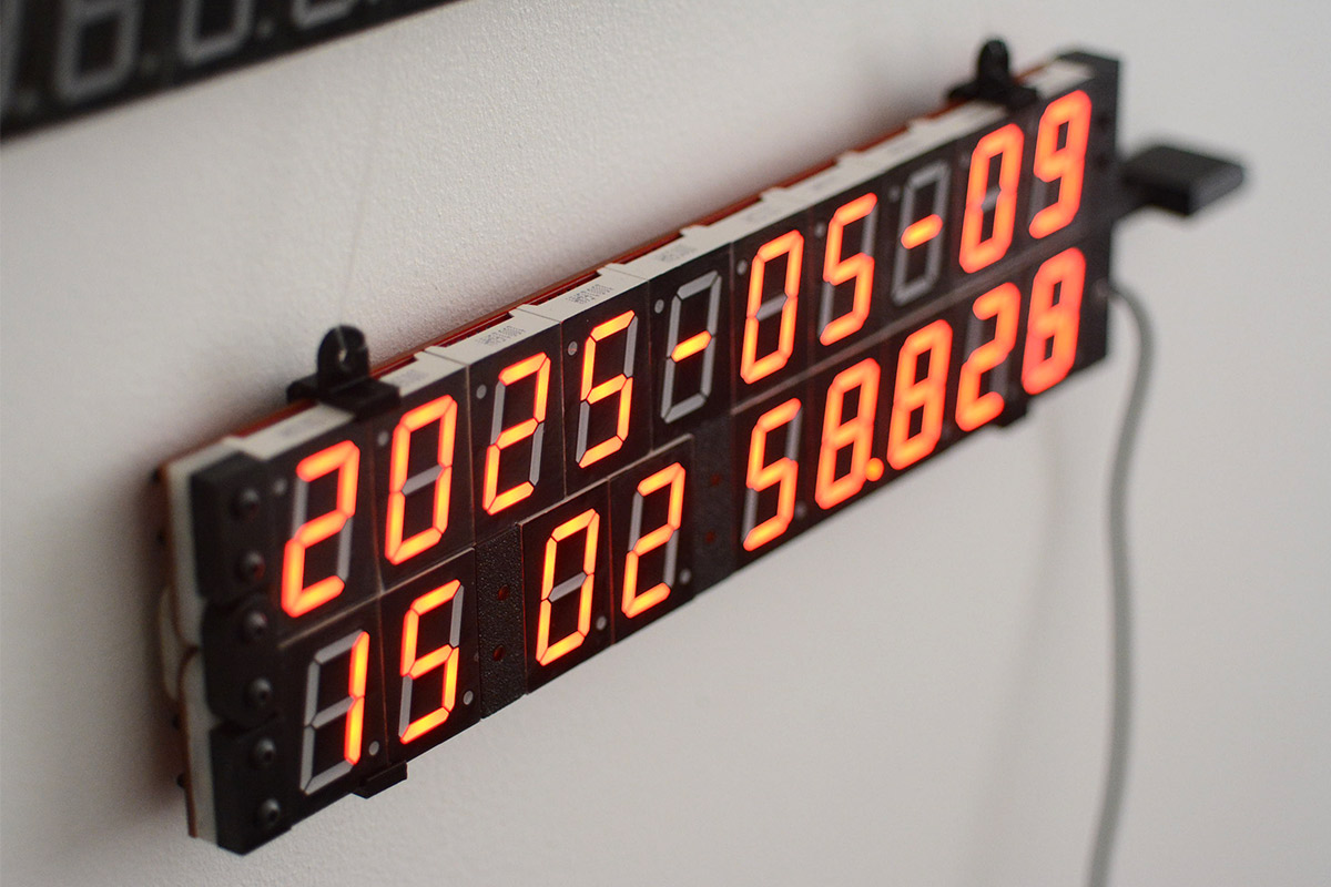 Closeup of clock in folded position hanging on wall