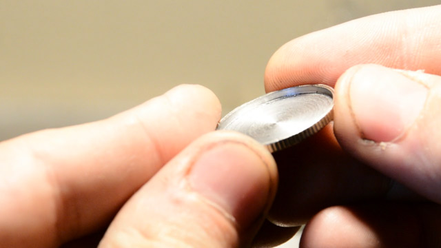 Edge view of bored out coin shell