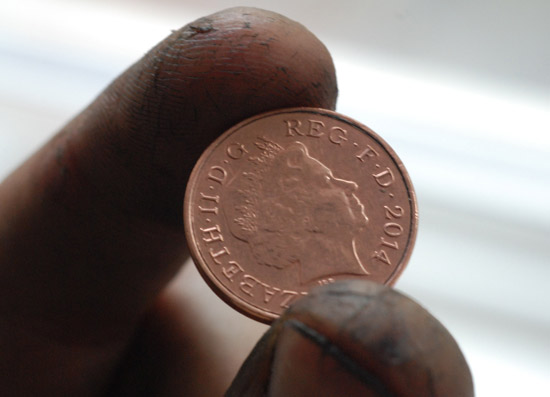 Coin reassembled showing almost no sign of interference