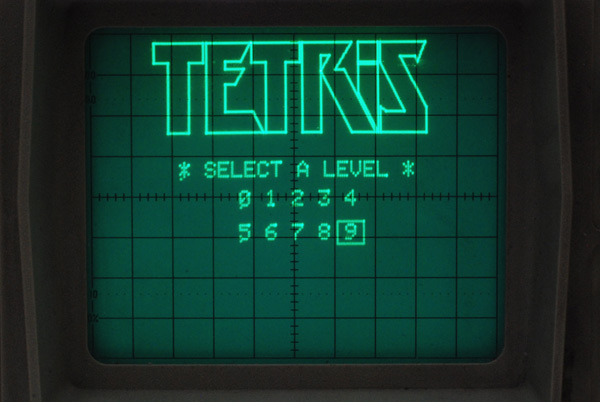 Oscilloscope screen with Tetris logo and 'Select a Level' menu