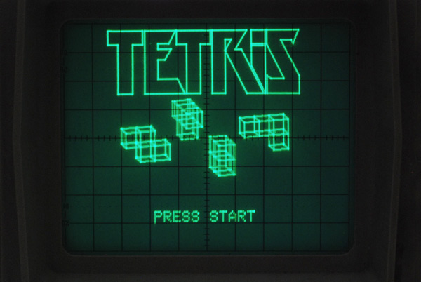 Oscilloscope screenshot of the Tetris title screen, with wireframe 3D models of the tetrominoes
