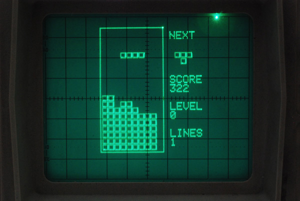 Oscilloscope screen of Tetris being played, column on the left still open, finally the long thin tetromino has spawned