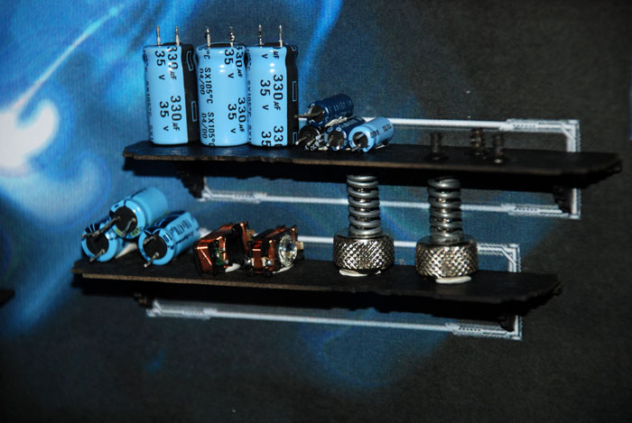 Electric components on the shelves of the model