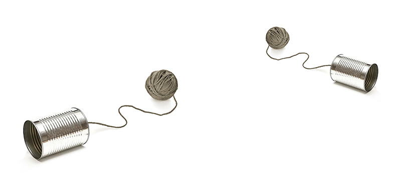 Two tin cans and balls of string