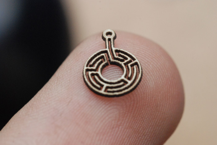 Laser etched labyrinth design earring