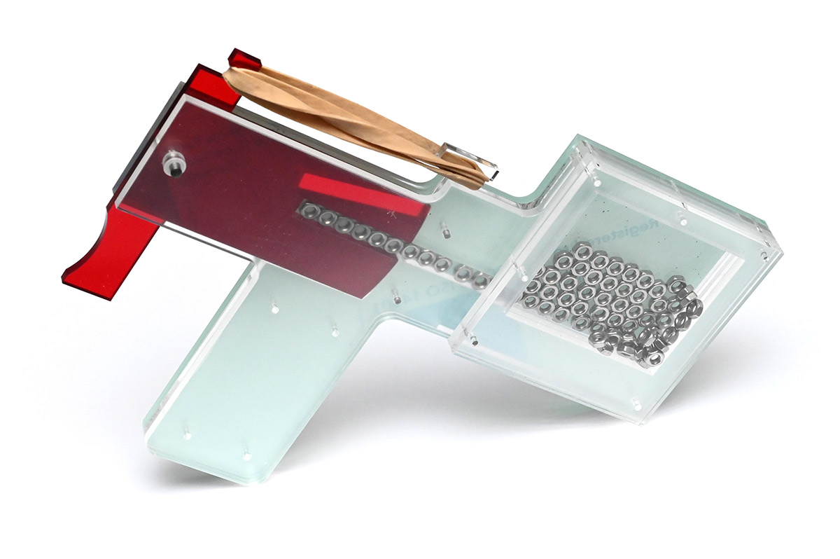 M3 Nut dispenser, partially filled, balanced on end