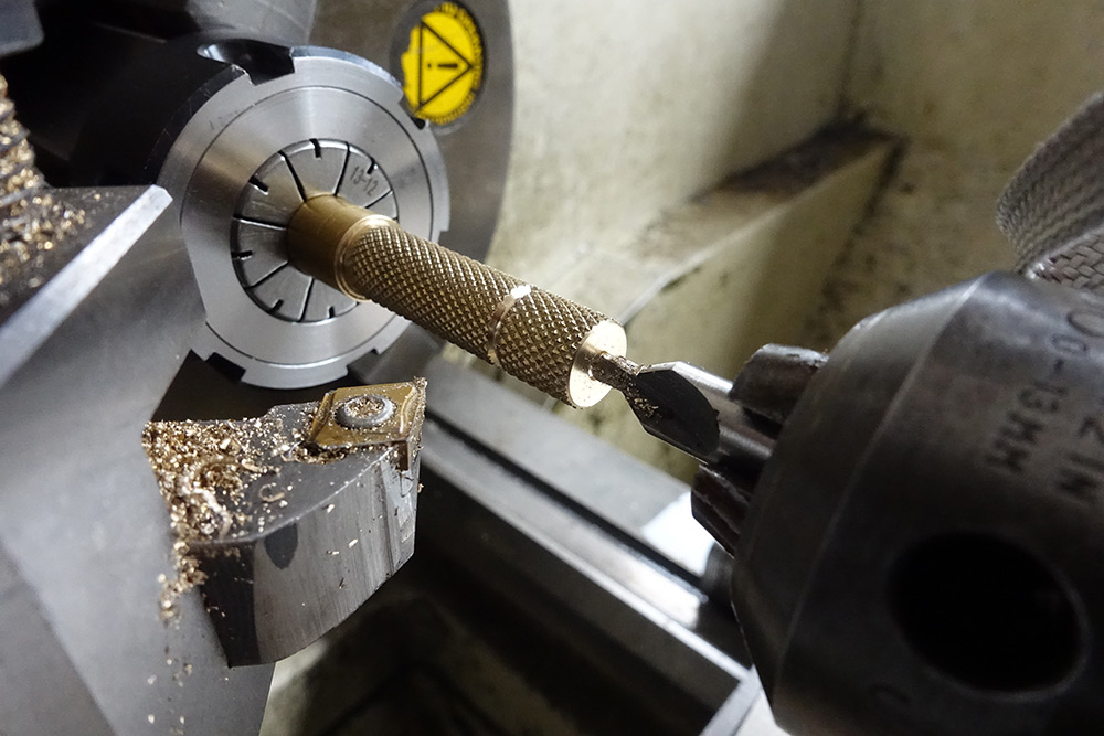 Using a centre drill on the knurled brass