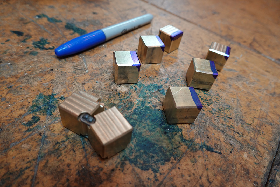 Marking the edges of the cubes with sharpie