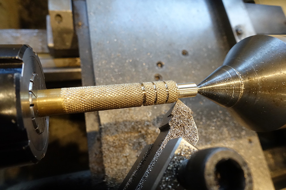 Turning down the knurled brass