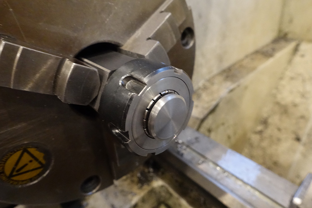 A steel part mounted in an ER32 collet held in the 3 jaw chuck
