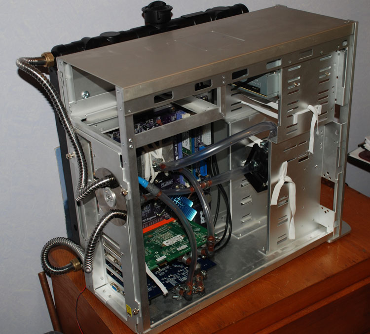 Full view of the watercooling setup with pump suspended from elastic