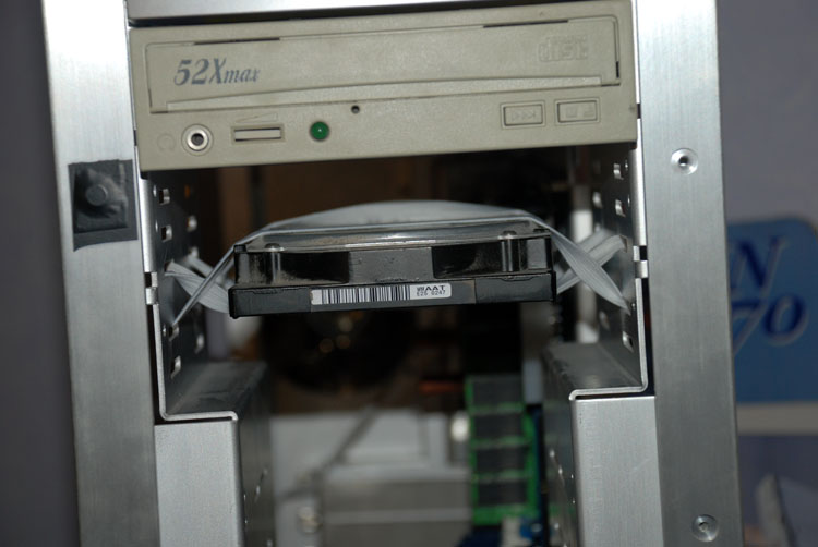 The hard drive mounted on elastic