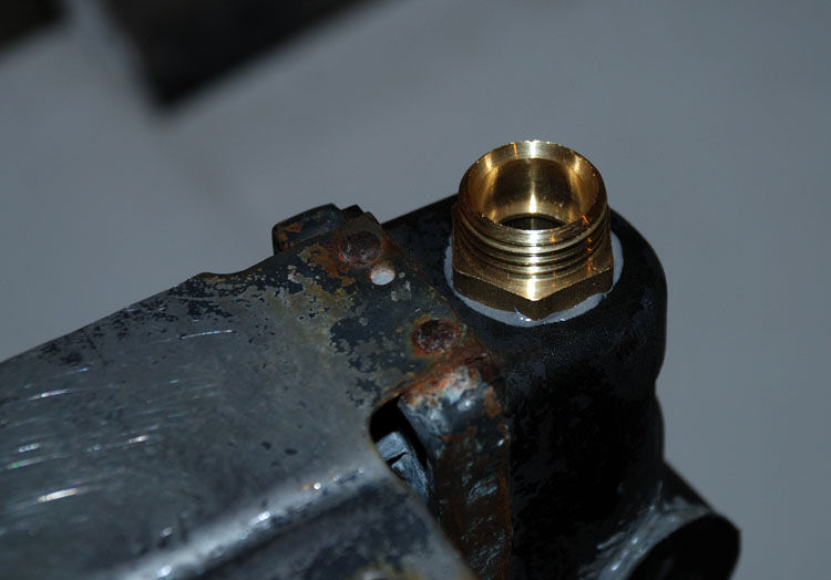 Epoxy used to attach brass fitting