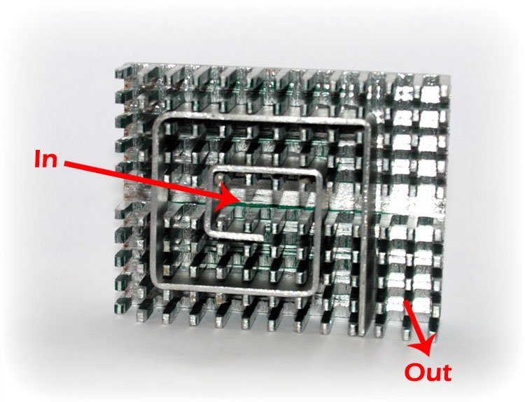 View of the CPU waterblock with inlet and outlet labelled