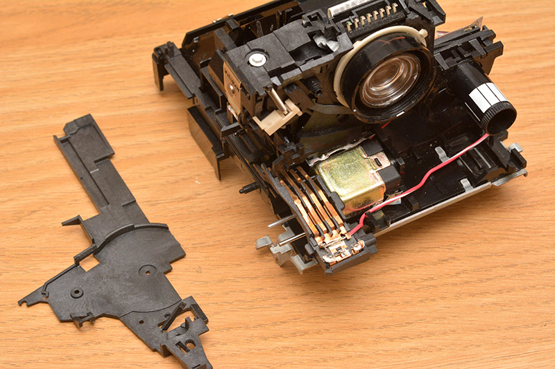 Partly dismantled polaroid camera