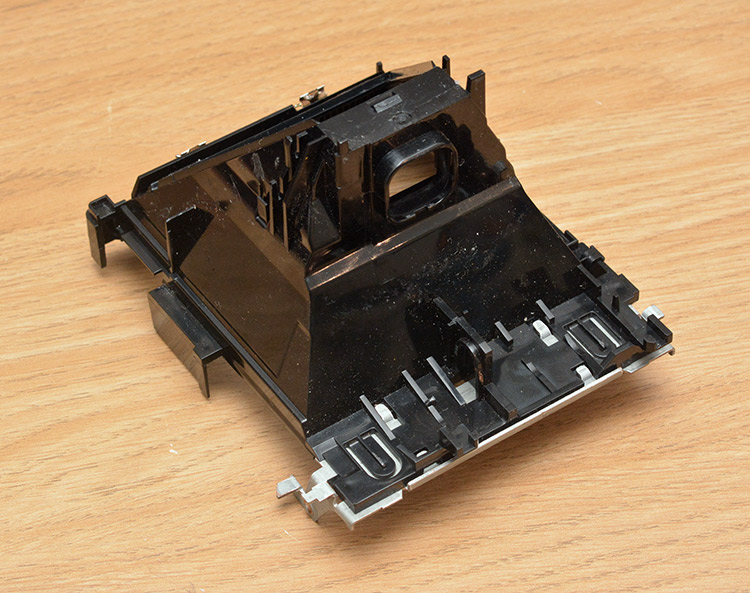 Fully dismantled polaroid camera